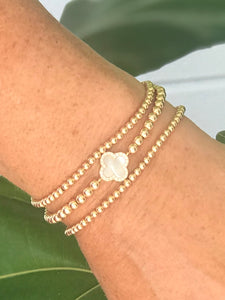 vermeil clover + gold bead stack