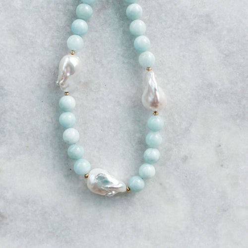 natural baroque pearl, aquamarine, and gold necklace