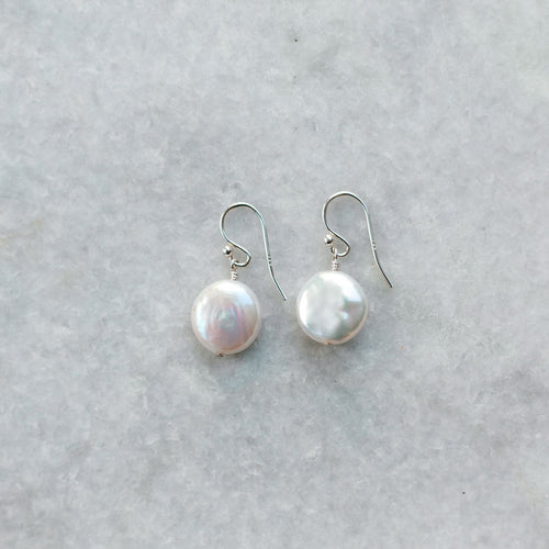 natural 12 mm coin pearl earring with a sterling silver ear wire